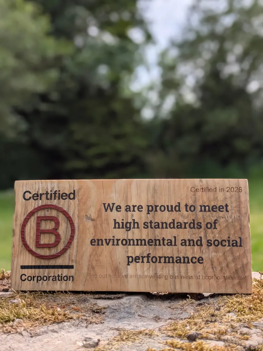 A wooden plaque to make B Corp certification official